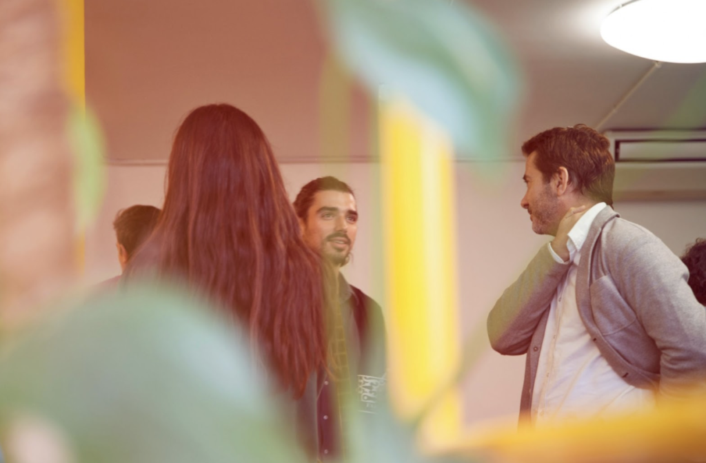People Talking at a Networking Event